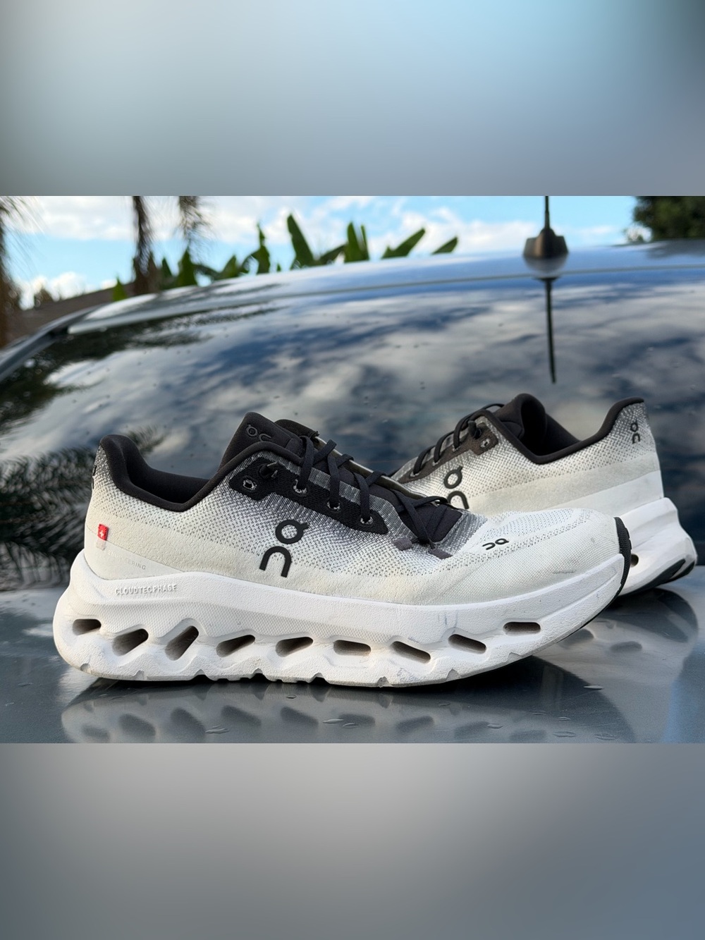 On Running Cloud Men’s Sneakers in White and Black Accents